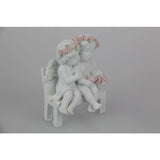 Load image into Gallery viewer, Cherub Couple with Rose Band on Chair - 10cm