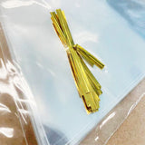 Load image into Gallery viewer, 25 Pack Triangle Plastic Bags with Gold Tie - 13cm x 25cm
